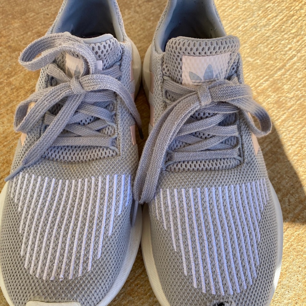 Adidas tennis shoes, gently worn. Clean